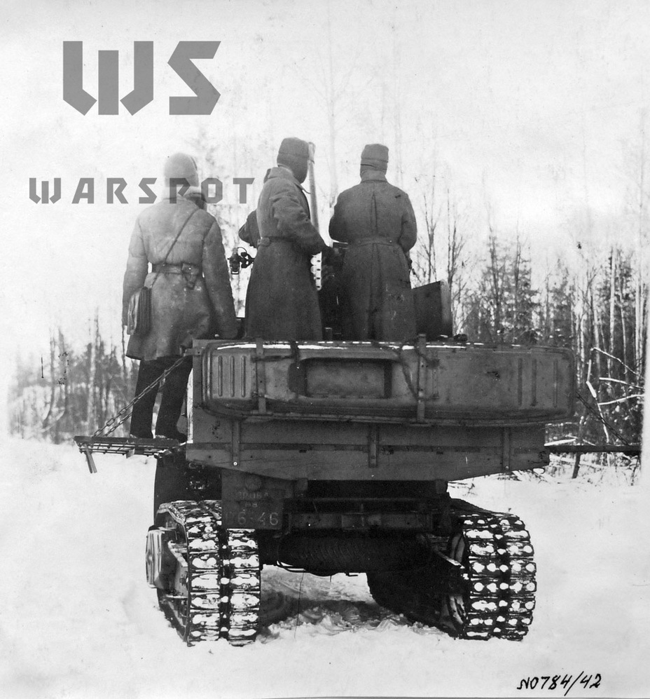 ​Skis installed during movement across snow are visible on the rear wall of the truck bed - Halftrack Experiments | Warspot.net