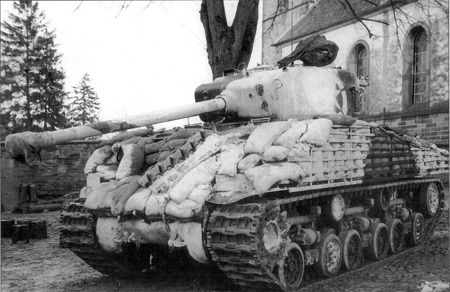 ​An M4A3(76)W HVSS tank with sand bag armour - The Tank's Hidden Foe | Warspot.net