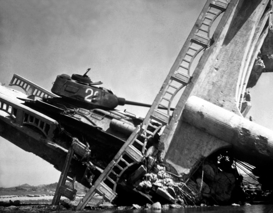 ​A famous photo of a T-34-85 tank abandoned near the Korean city of Suwon. The tank was lost when the bridge that it was crossing collapsed after being hit by American aircraft - A Tank from a Former Ally | Warspot.net