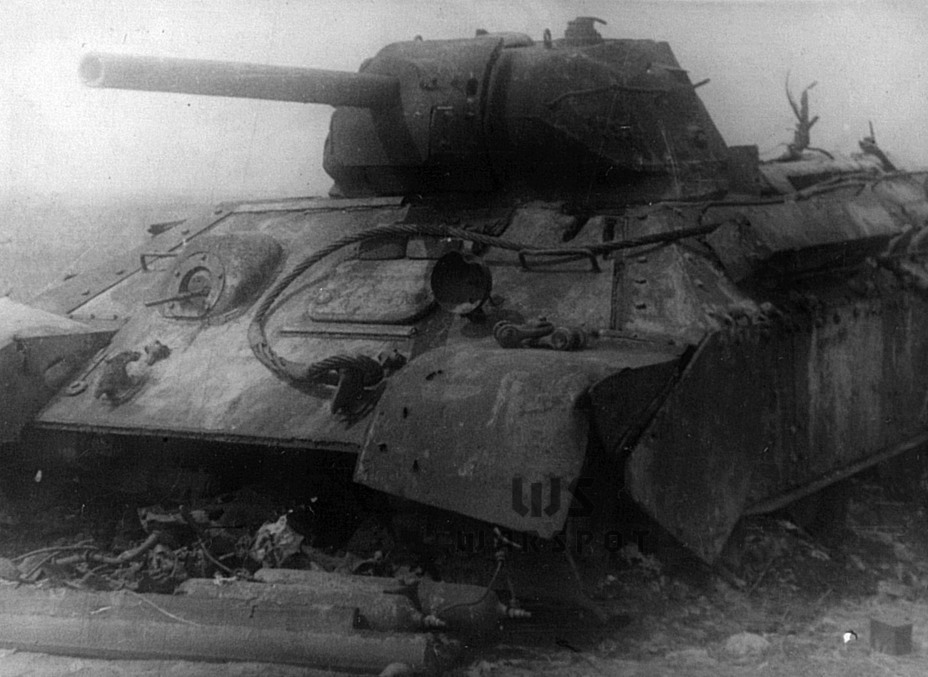 ​T-34 tank, turret number 232, from the 41st Tank Brigade. This tank had the second type of spaced armour. The tank was destroyed by a hit of a 75 mm shell to the front of the hull - Temporary Reinforcement | Warspot.net