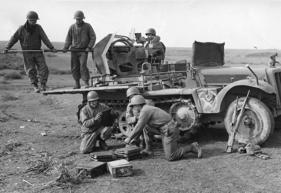 ​American soldiers servicing a captured Sd.Kfz.10/4 - A Light and Simple SPAAG | Warspot.net