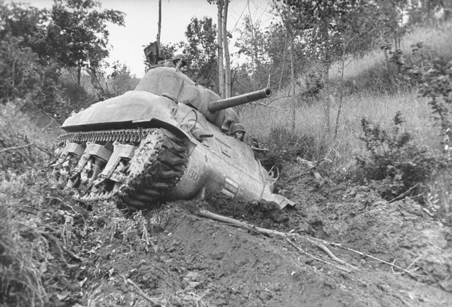 ​A Medium Tank M4A1 that sank in mud, Miturno, Italy, 1944. The high weight and narrow tracks of this vehicle meant that off-road mobility was low - Shermans in Mud | Warspot.net