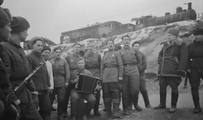 ​Musical ensemble of 13th Guards Rifle Division. The photo was taken near the mouth of the Dolgy ravine. Above is the ruined warehouse of the brewery - Unknown Stalingrad: Pavlov’s House, Anatomy of a Legend | Warspot.net