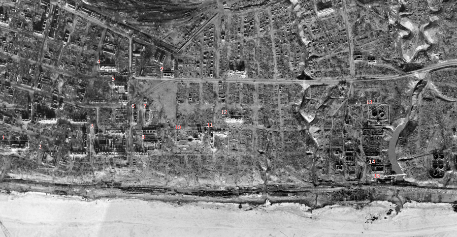 ​Location of landmarks mentioned in the study, from a German aerial photograph taken in March 1943: 1 — State Bank; 2 — Ruins of the Brewery; 3 — Complex of buildings of the NKVD; 4 — School number 6; 5 — Voentorg; 6 — «Zabolotny House»; 7 — «Pavlov House»; 8 — Mill; 9 — «Milk House»; 10 — «House of Railway Workers»; 11 — «L-shaped house»; 12 — School number 38; 13 — Oil tanks (German stronghold); 14 — Refinery; 15 — Factory warehouse - Unknown Stalingrad: Pavlov’s House, Anatomy of a Legend | Warspot.net