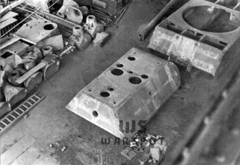 ​A Typ 205 hull and turret at a Krupp warehouse, 1945. Unneeded VK 36.01 turrets can be seen in the right corner - Stillborn Maus  | Warspot.net