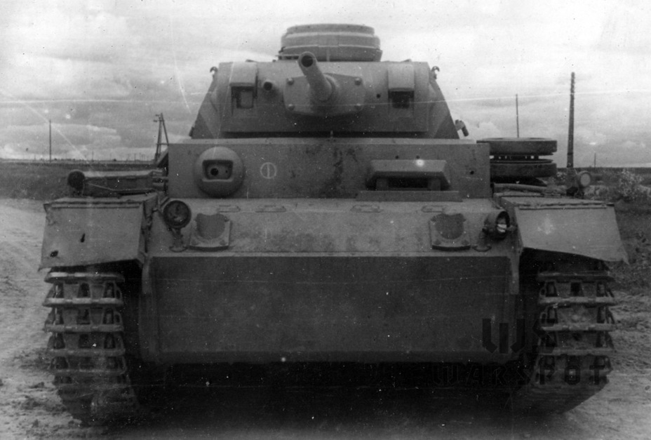 ​The insignia of the 11th Tank Division can be seen on the front plate. The tank was built in December of 1941 and had sand-coloured camouflage - The Last of the Threes | Warspot.net