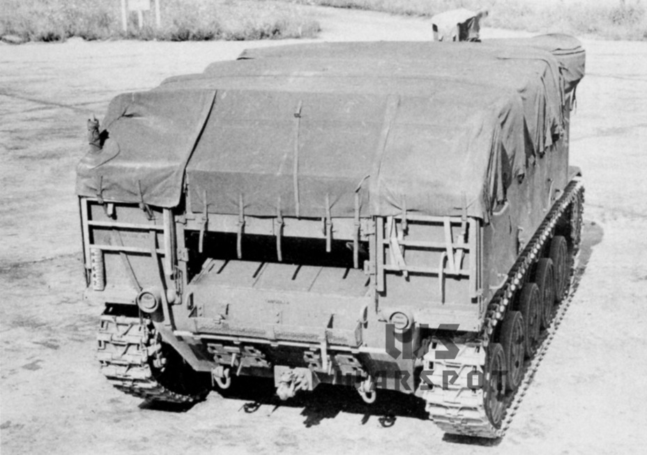 ​The HMC T76 on the march. A tarp held with supports offered good protection from the elements, but installing and tearing down the tent took a long time - HMC M37: a Fast Howitzer on a Light Chassis | Warspot.net