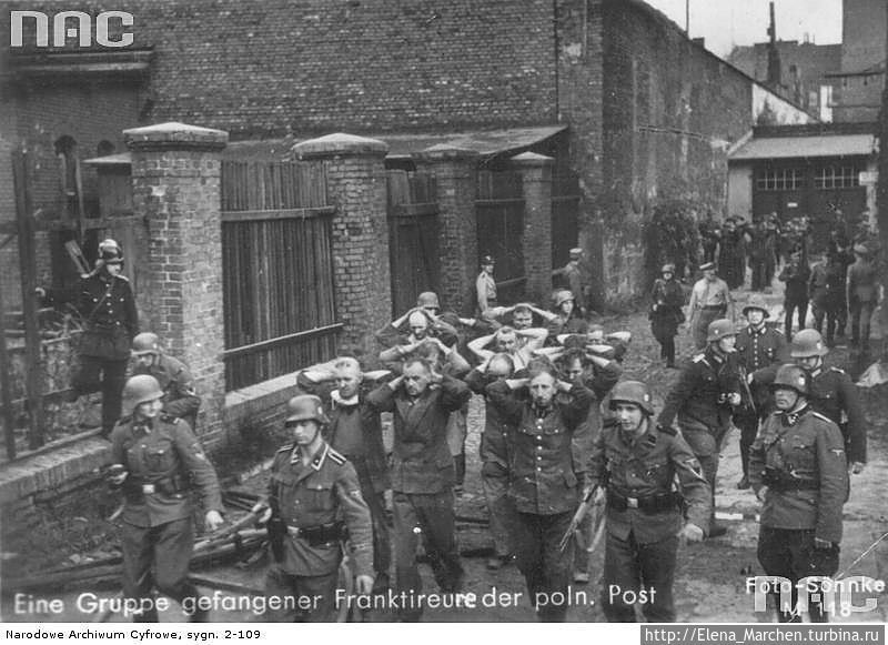 ​The captured defenders of the Polish Post Office being escorted by German soldiers. http://turbina.ru - Polish Postmen Against SS and SA | Warspot.net