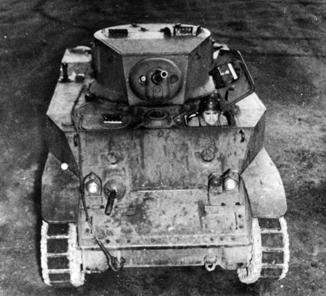 ​The later version of the tank can be distinguished by a fan between the hatches of the driver and his assistant. This photo also shows the driver, controlling the tank in travel position - Light Tank M5: The Peak of Evolution | Warspot.net